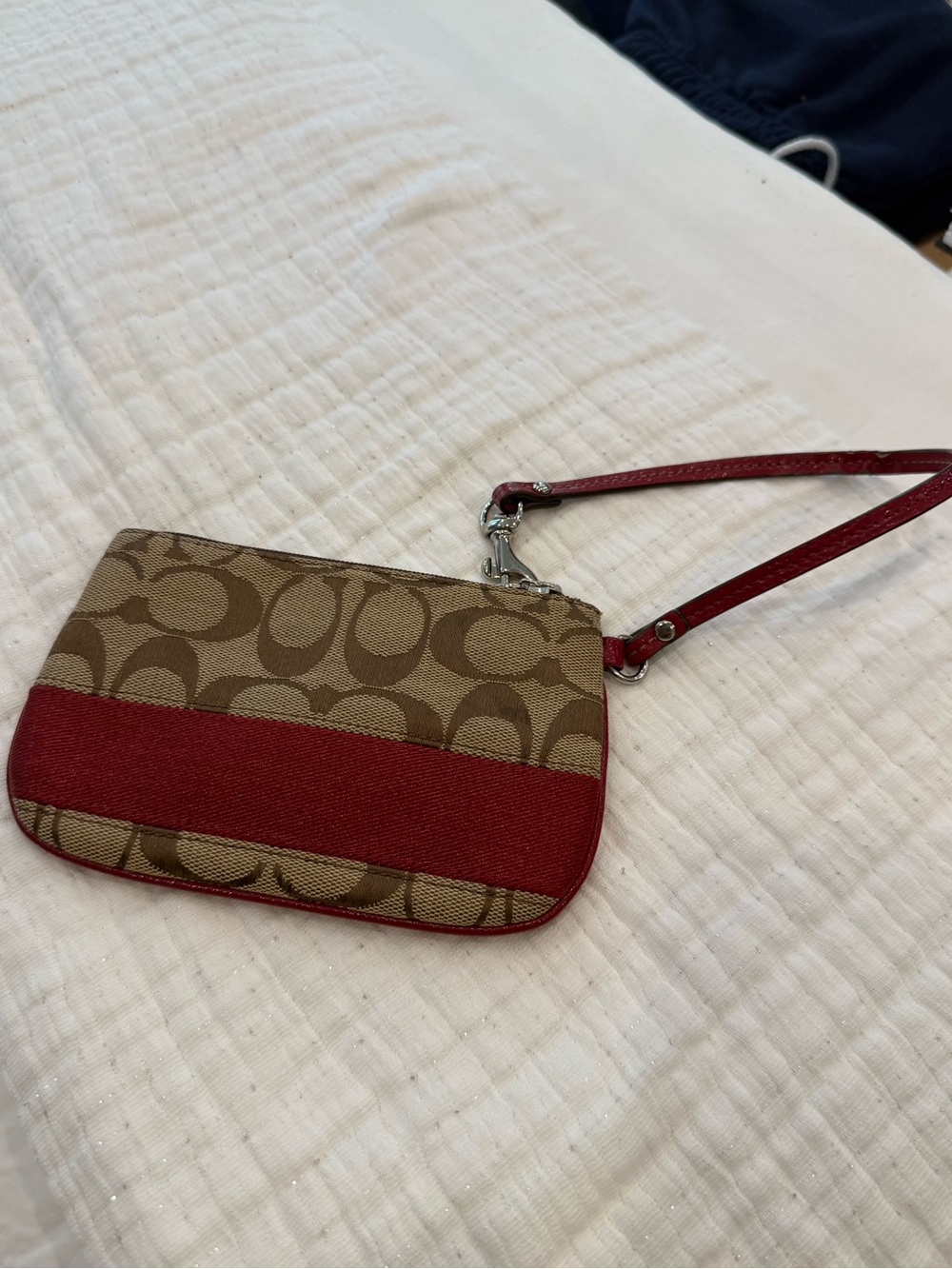 Coach Tan Signature Canvas Wristlet with Red Accent Strap